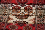 Few handmade carpets with traditional ornament. Turkmenistan. Ashkhabad market.